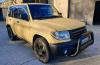 1352mitsubishi-pajero-io-front-right.jpg