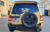 mitsubishi-pajero-io-back-min.jpg