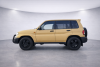 mitsubishi_pajero_io_side_view_in_showroom_suv_hire_tbilisi_airport_georgia.png