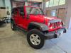 red-jeep-wrangler-4x4-side-front.jpg.jpeg